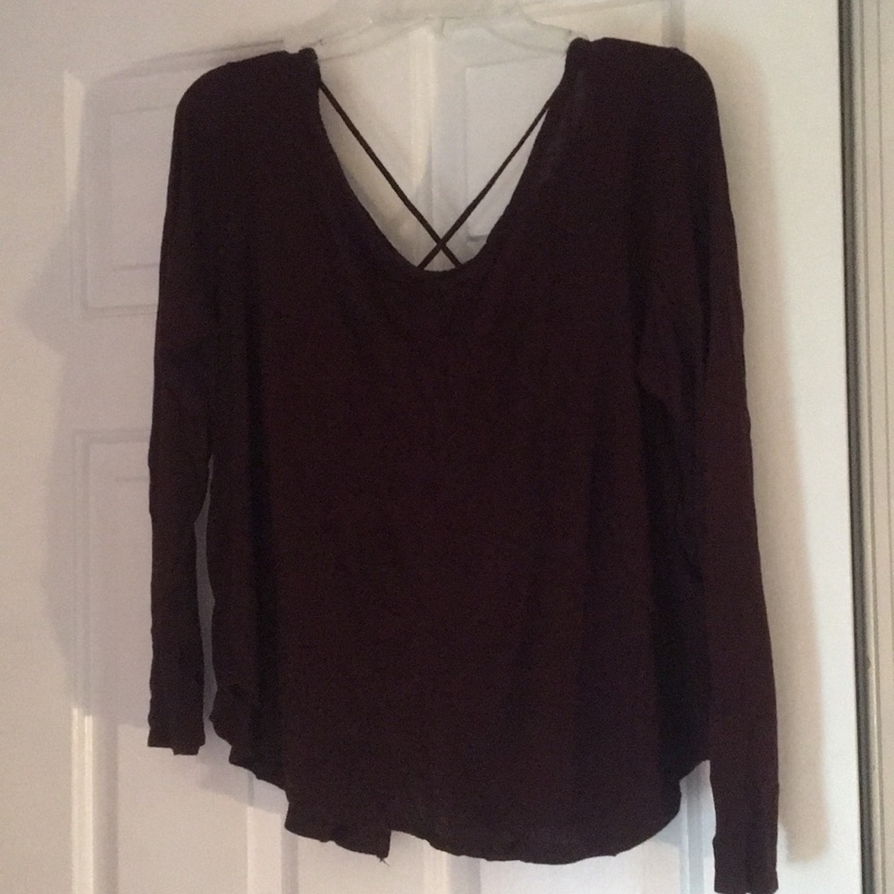 Long sleeve maroon top with cross back and slit